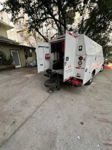 Magnet Plumbing service vehicle on-site for Grease Trap Cleaning in Cape Canaveral